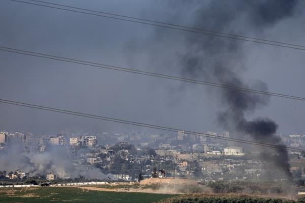 An Israeli tank moves inside the Gaza Strip, as seen from Israel on Oct. 31, 2023. 