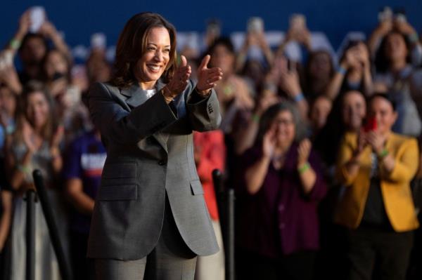 U.S. Vice President Kamala Harris greeting her audience before discussing reproductive rights at a Phoenix event on the second anniversary of Roe v. Wade being overturned