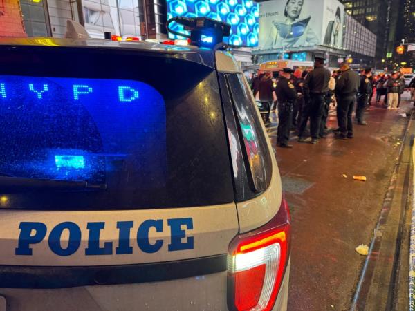 An NYPD vehicle at the Times Square crime scene