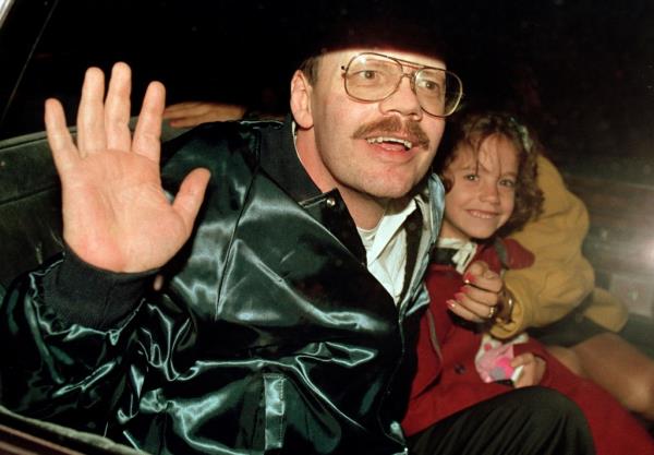 Anderson celebrating with his sister Peggy Say (left) after arriving at Wiesbaden Air Force hospital in Germany.