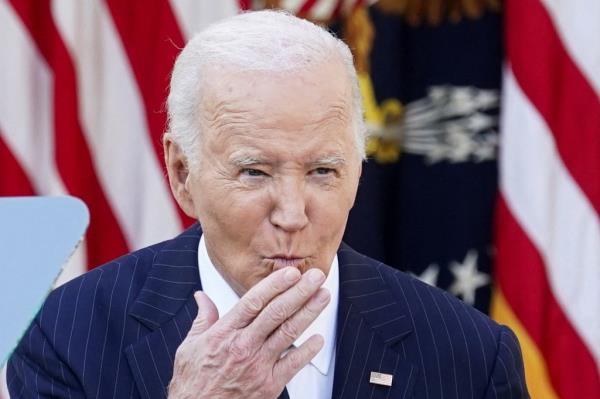 Biden blew a kiss to his audience of staffers and family.