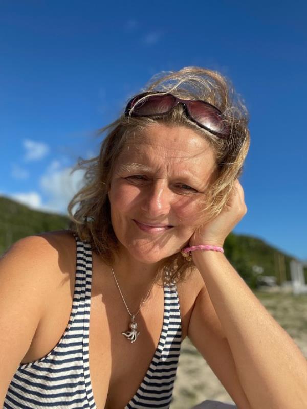 A woman on a beach. 
