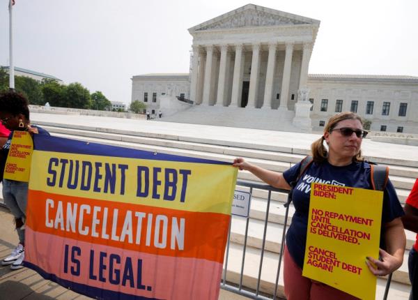 Supporters reacting outside the U.S. Supreme Court after a decision against President Biden's plan to cancel $430 billion in student loan debt