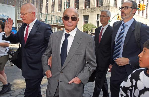 Tottenham Hotspur soccer club Joe Lewis (pictured) leaves federal court after his arraignment