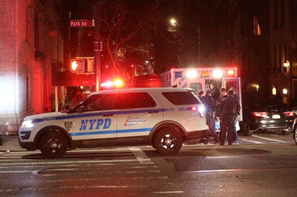 Police respond to a report of a man robbed of his cell phone on Park Avenue in the Upper East Side in 2023.