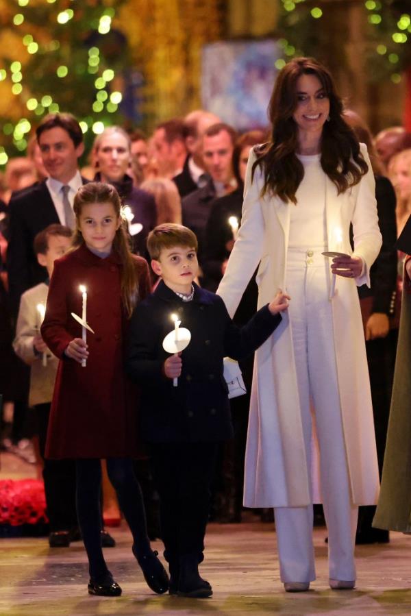 Princess Charlotte, Prince Louis and Kate Middleton at the duchess' Christmas co<em></em>ncert in Lo<em></em>ndon on Dec. 8, 2023. 