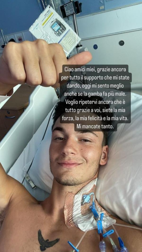 Mariotti is pictured in a hospital bed.