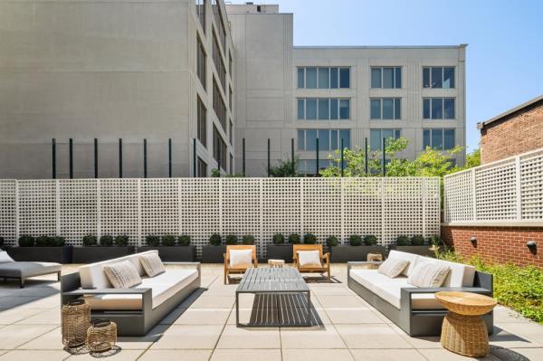Exterior of the outdoor at the Mott St. address. 