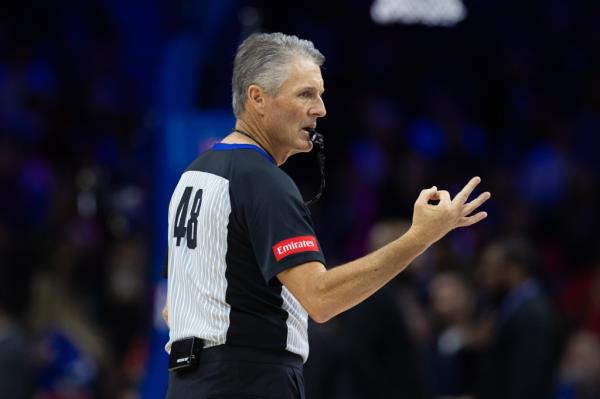 Referee Scott Foster