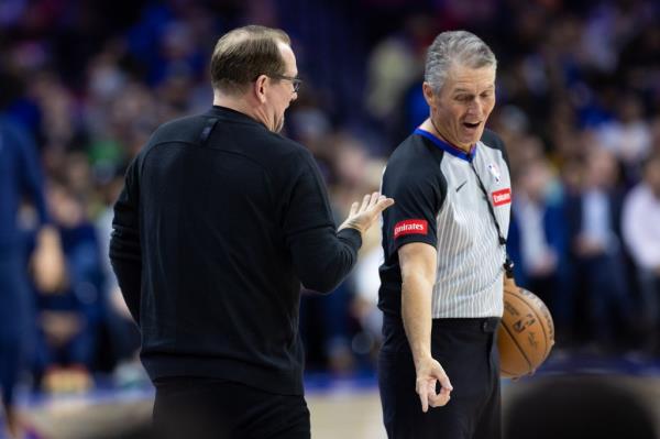 Philadelphia 76ers head coach Nick Nurse questions a call with referee Scott Foster (48) during the second quarter against the Memphis Grizzlies at Wells Fargo Center. 