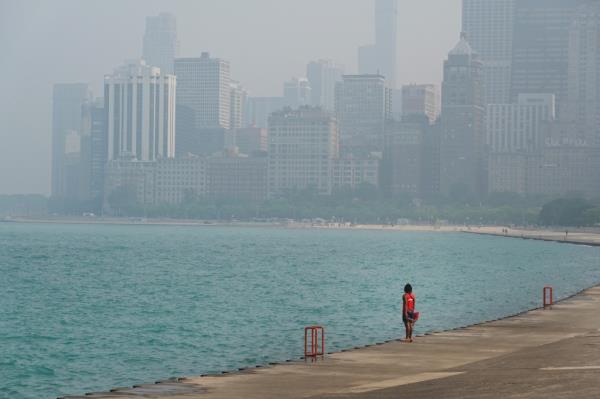 Cities such as Chicago(pictured,) Indianapolis, Cleveland, Pittsburgh and Philadelphia all experienced poor air quality and reduced visibility.