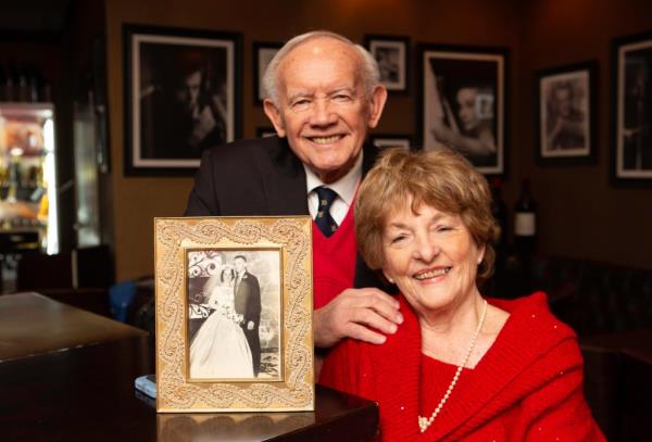 George and Caroline Hochbrueckner: A couple smiling at the camera after renewing their wedding vows after 62 years of being married.