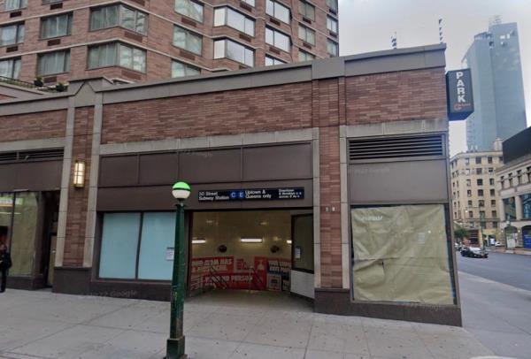 The outside of the 50th Street A and C train station.</p>

<p>　　