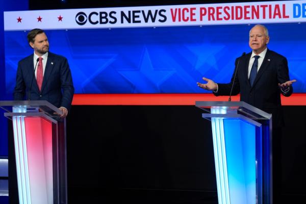 Walz on the debate stage with Republican vice presidential candidate Sen. JD Vance in Manhattan on Oct. 1, 2024.