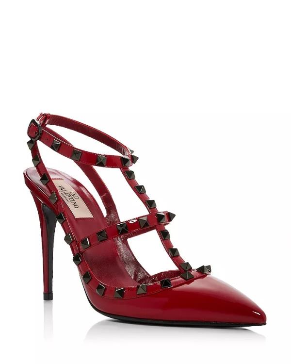 A red high heeled shoe with black spikes from Bloomingdales for Alexa NYFW, photo courtesy of the brand