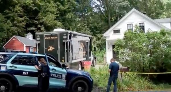 New Hampshire State Police are seen cordo<em></em>ning off the Durham home.