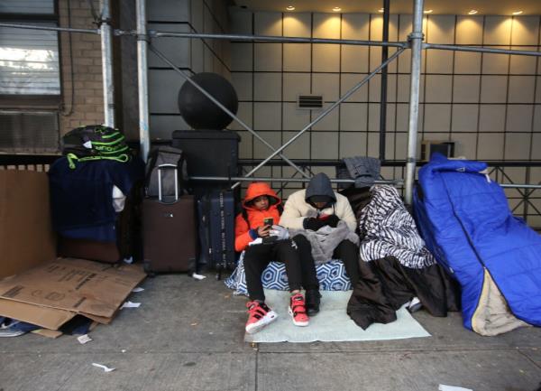Migrants at the Watson Hotel in Manhattan.