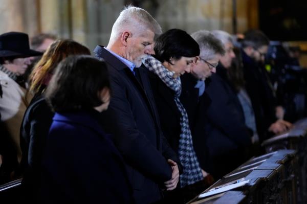 Petr Pavel, president of Czech Republic, seen among a row of mourners at a mass for the victims of the shooting at St. Vitus Cathedral in Prague Saturday.