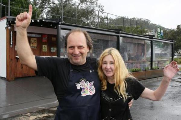 Valentino Kocavic and his wife Tracey in front of their Eat Street Cafe in Gosford. 