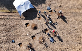 Archaeologists find items during excavation work at the site