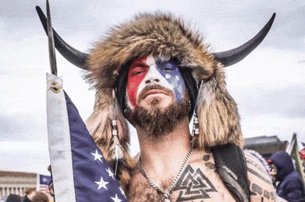 The QAnon Shaman, Do<em></em>nald Trump, and the US Supreme Court.