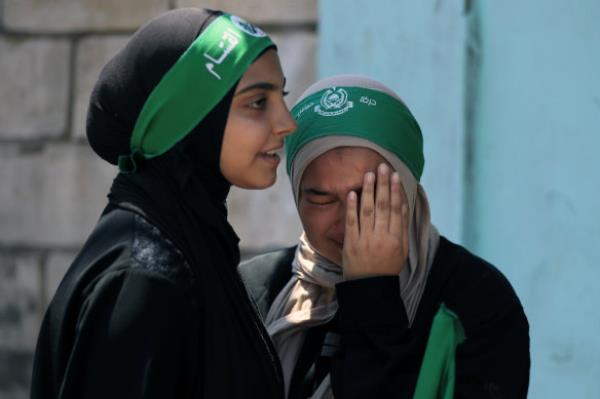 A young woman reacts during a protest in Lebanon to co<em></em>ndemn the killing of Hamas political chief Ismail Haniyeh.