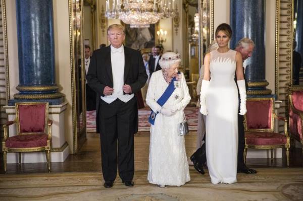Then US President Do<em></em>nald Trump, the now late Queen Elizabeth II and Melania Trump during a group photo at Buckingham Palace.