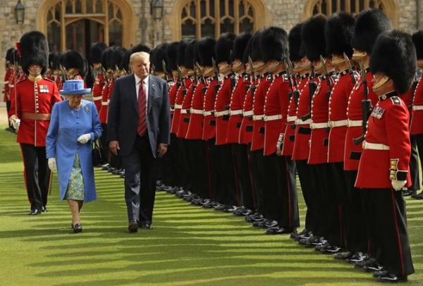 Then US President Do<em></em>nald Trump and Britain's Queen Elizabeth II inspected a Guard of Honour, formed by the Coldstream Guards at Windsor Castle in Windsor in 2018.