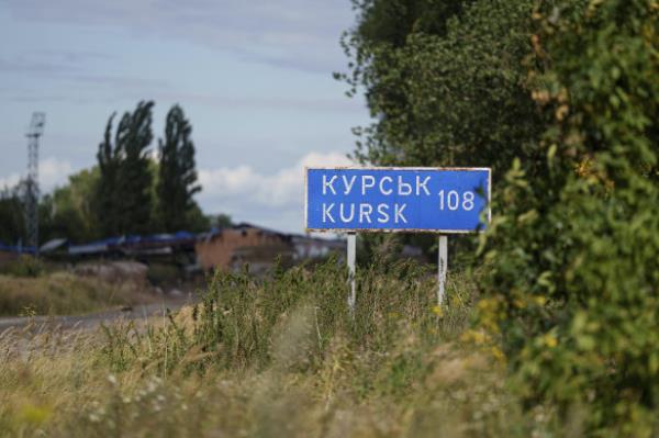 A sign indicating 108 kilometres to Kursk on the Russian-Ukrainian border in Sumy region, Ukraine.