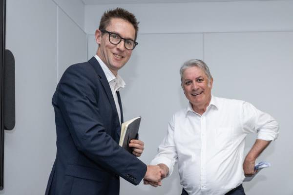 Former editor-in-chief of The Australian Financial Review Michael Stutchbury with his replacement, James Chessell.