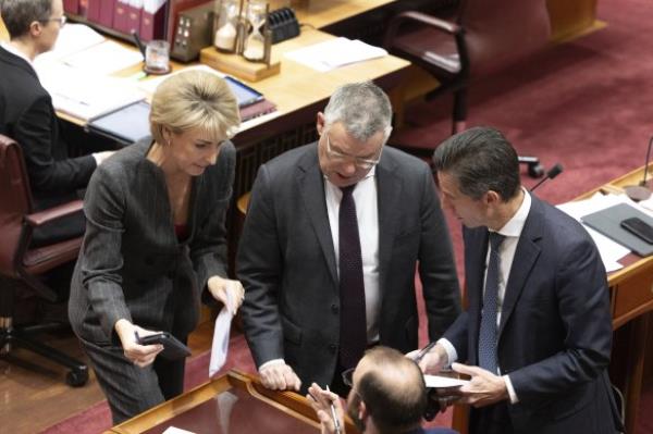 Opposition workplace relations spokeswoman Michaelia Cash (left), Workplace Relations Minister Murray Watt and Leader of the Opposition in the Senate Simon Birmingham in Parliament House last night.