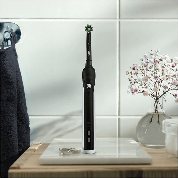 OralB Pro 1 toothbrush on bathroom sink