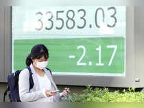 Japan's Nikkei seen rising to 35,000 by mid-2024 on earnings boost
