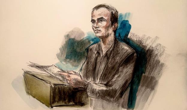 Man stands at podium
