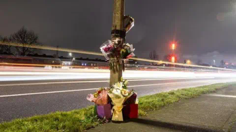 PA Flowers laid at the scene near Blanchardstown Shopping Centre on 26 December
