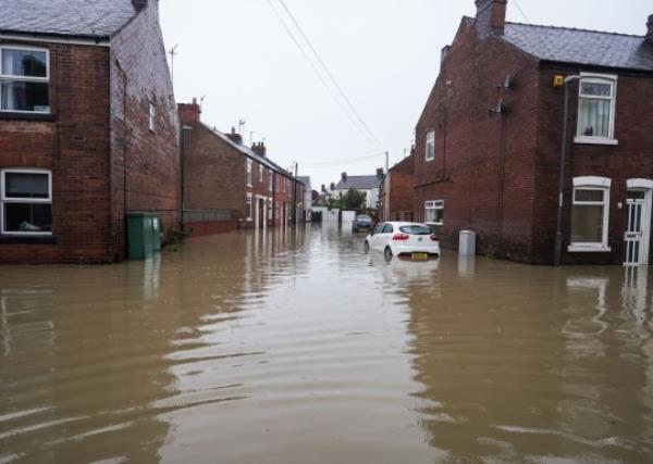  Licensed to Lo<em></em>ndon News Pictures. 21/10/2023. Chesterfield, UK. Houses have been flooded on Hawthorn Road in Chesterfield after heavy rain yesterday. An amber weather warming for rain is in place for parts of the UK as Storm Babet continues. Photo credit: Ioannis Alexopoulos/LNP
