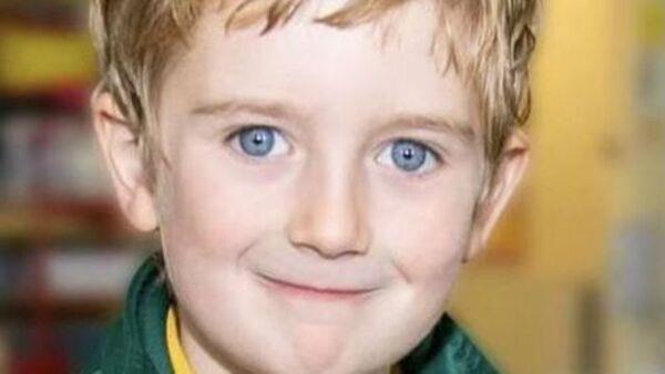 Vigil for boy found dead in car in Waterford: 'There is a dark cloud over the area'